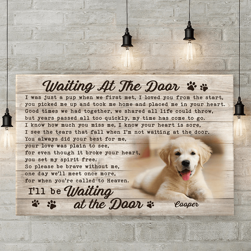 Personalized Custom Photo Memorial Pet Waiting At The Door canvas print, a woman hanging the framed print on a wall