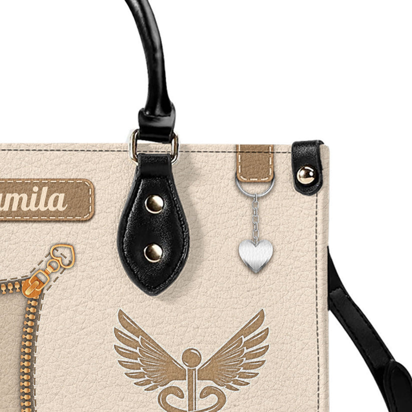 Registered nurse watercolor leather handbag with name, carried outdoors