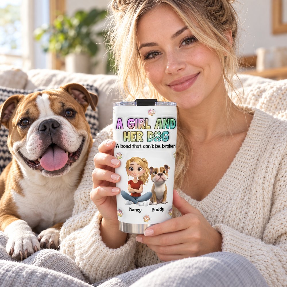 Dog mom holding her personalized A Girl And Her Dog 20oz tumbler on a cozy sofa