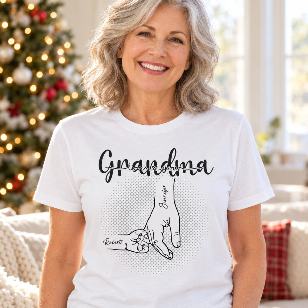 Grandma wearing personalized white t-shirt with holding hands print in bright holiday room