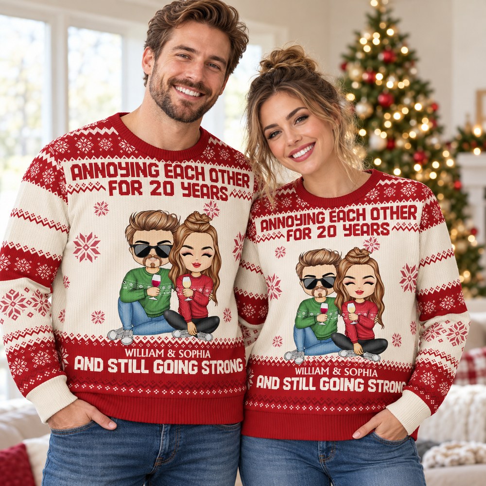 Couple wearing personalized Annoying Each Other For 20 Years ugly Christmas sweaters in festive living room