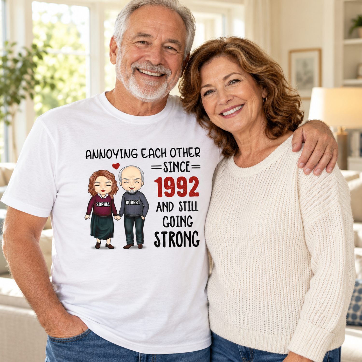 Older man wearing personalized Annoying Each Other Since 1992 couple t-shirt at home