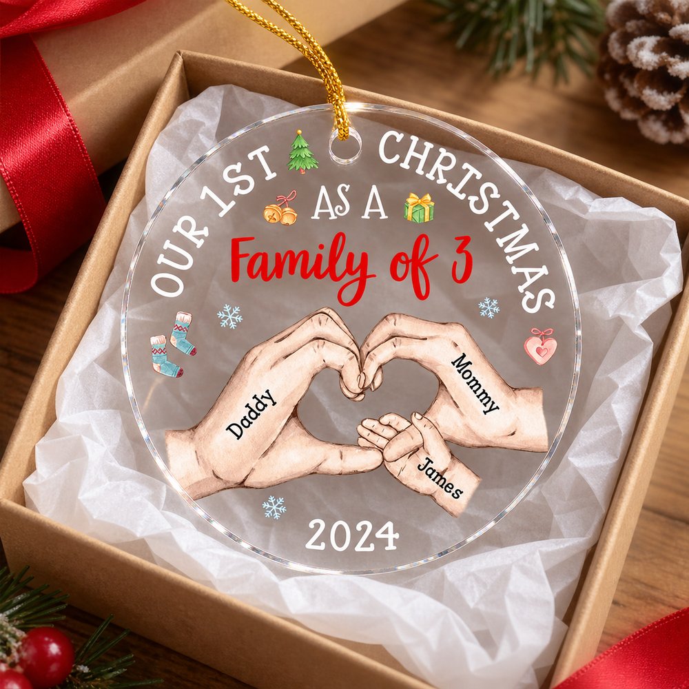 Personalized baby's first Christmas acrylic ornament in a holiday gift box with ribbon