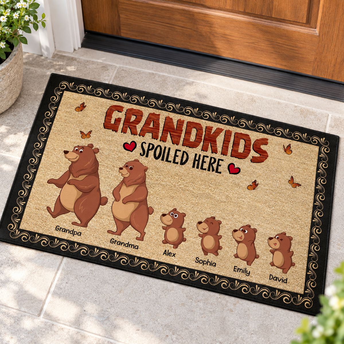 Close-up detail of the polyester felt texture and print on the Bear Grandkids Spoiled Here doormat