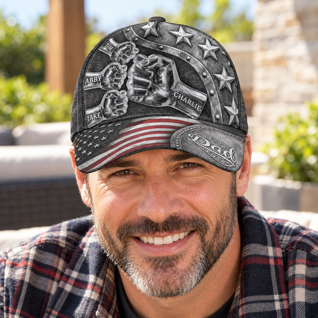 Dad wearing the personalized Best Dad Ever fist bump classic cap outdoors
