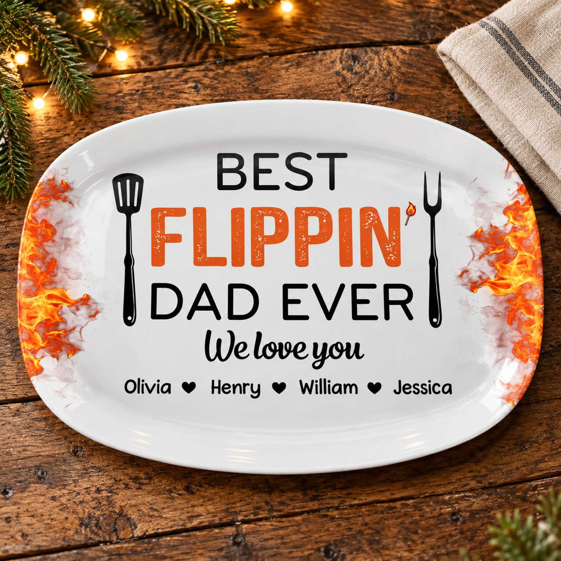 Personalized Best Flippin Dad Ever grilling platter on wooden holiday table with pine greenery