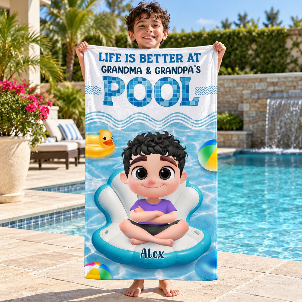 Grandchild holding personalized Life Is Better At Grandma Pool beach towel outdoors