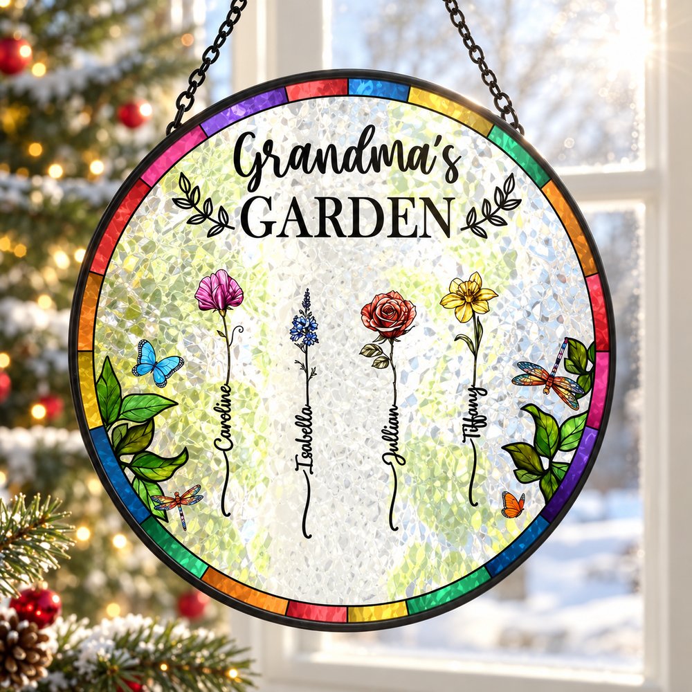 Personalized birth flower glass suncatcher hanging in window with Christmas tree background