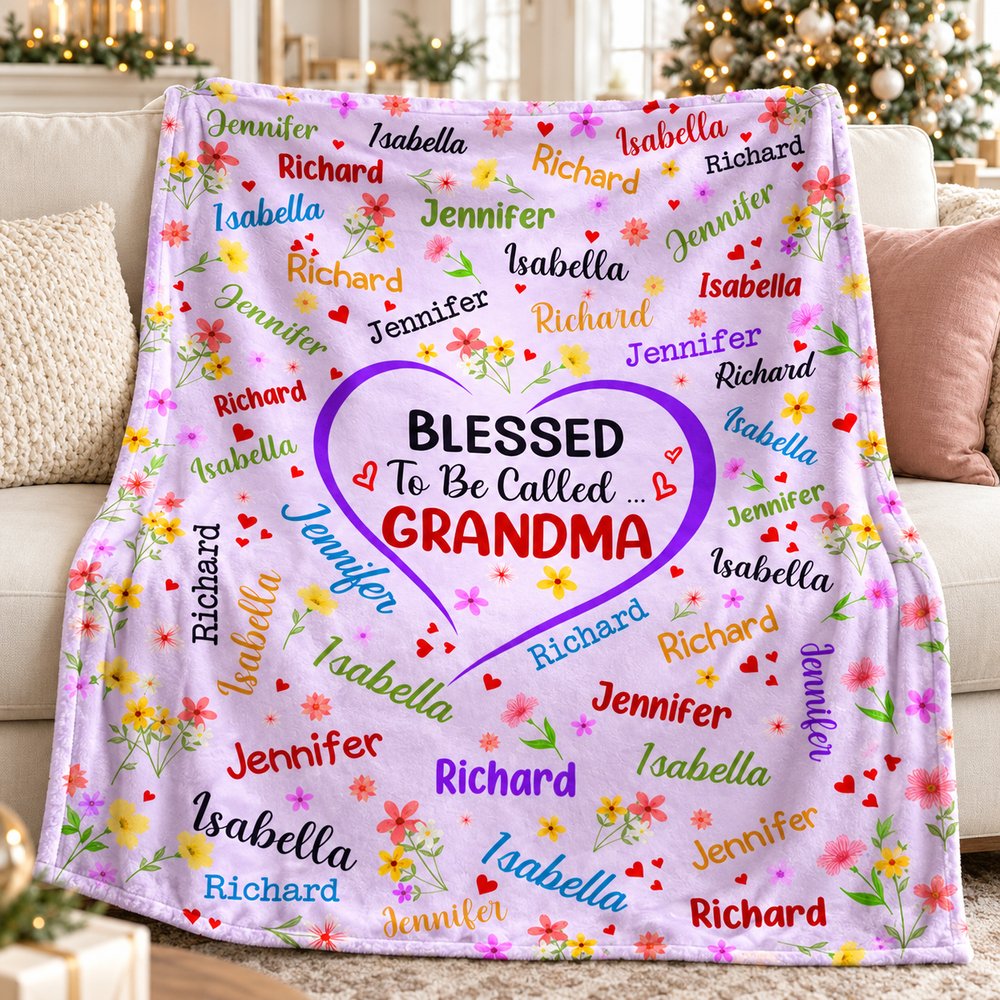 Blessed To Be Called Grandma personalized fleece blanket draped on a sofa by a Christmas tree