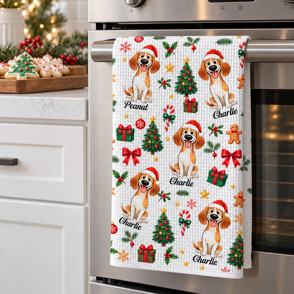 Personalized Christmas dog lovers waffle kitchen towel hanging on an oven handle in a festive holiday kitchen