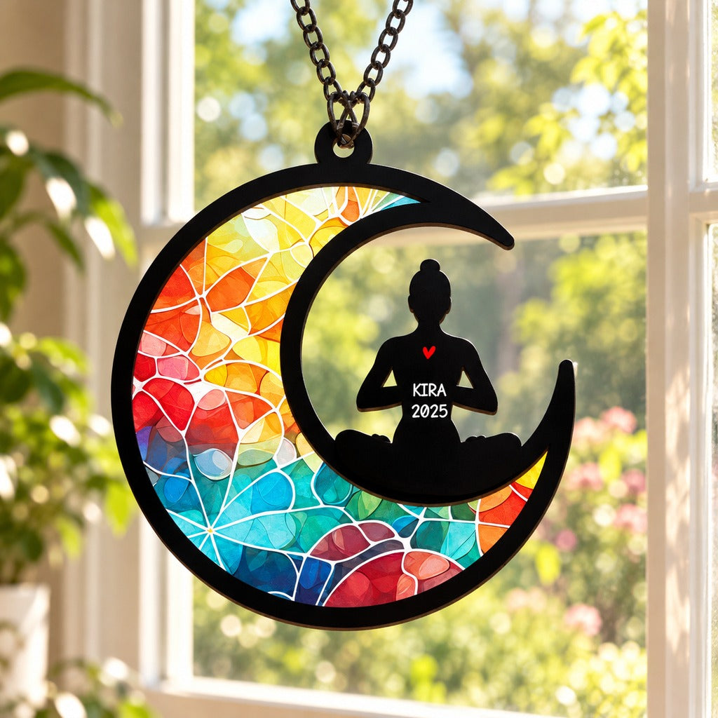 Personalized Yoga Suncatcher Ornament KIRA 2025 glowing in a sunny window