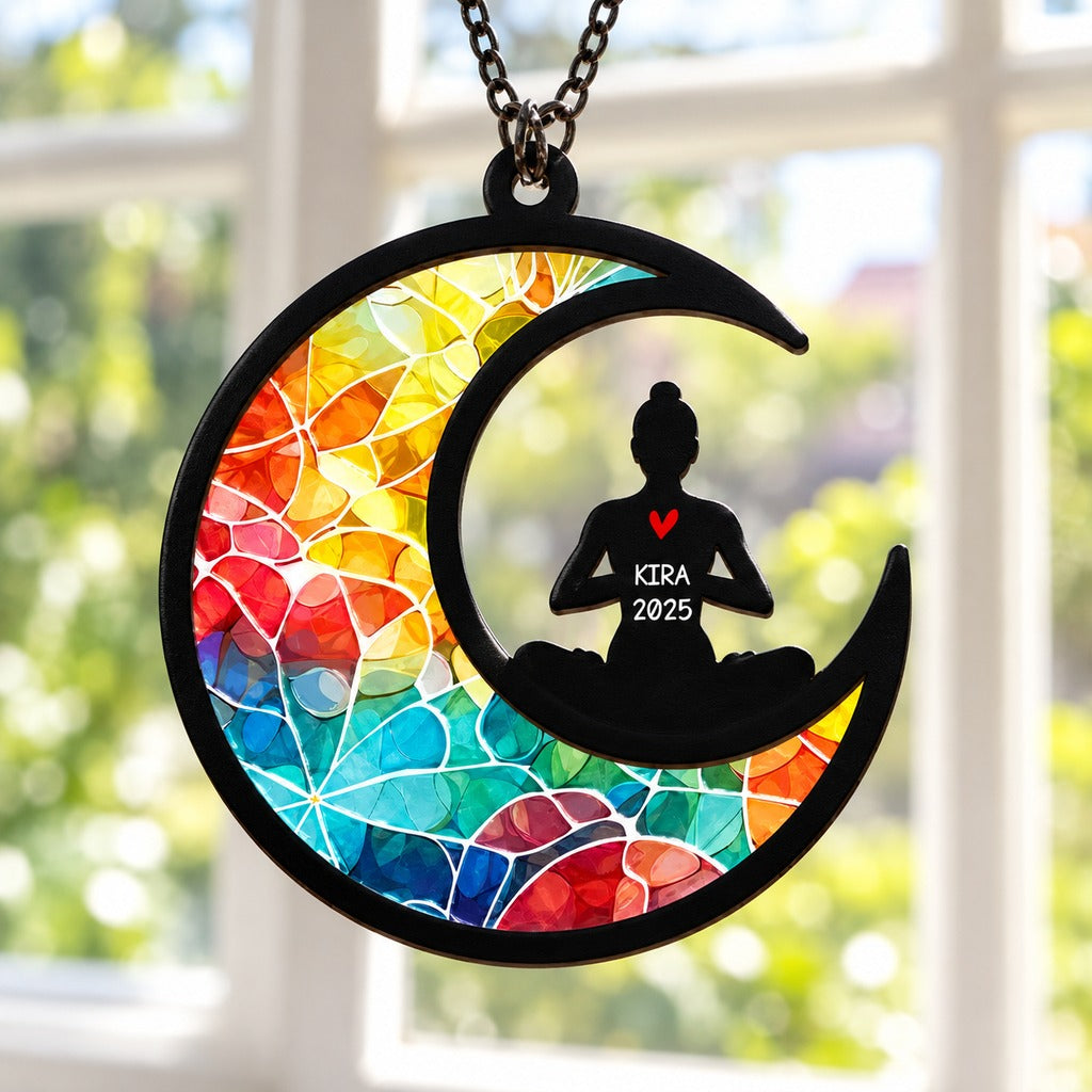 Close up detail of layered acrylic and wood Christmas Namaste Yoga suncatcher ornament