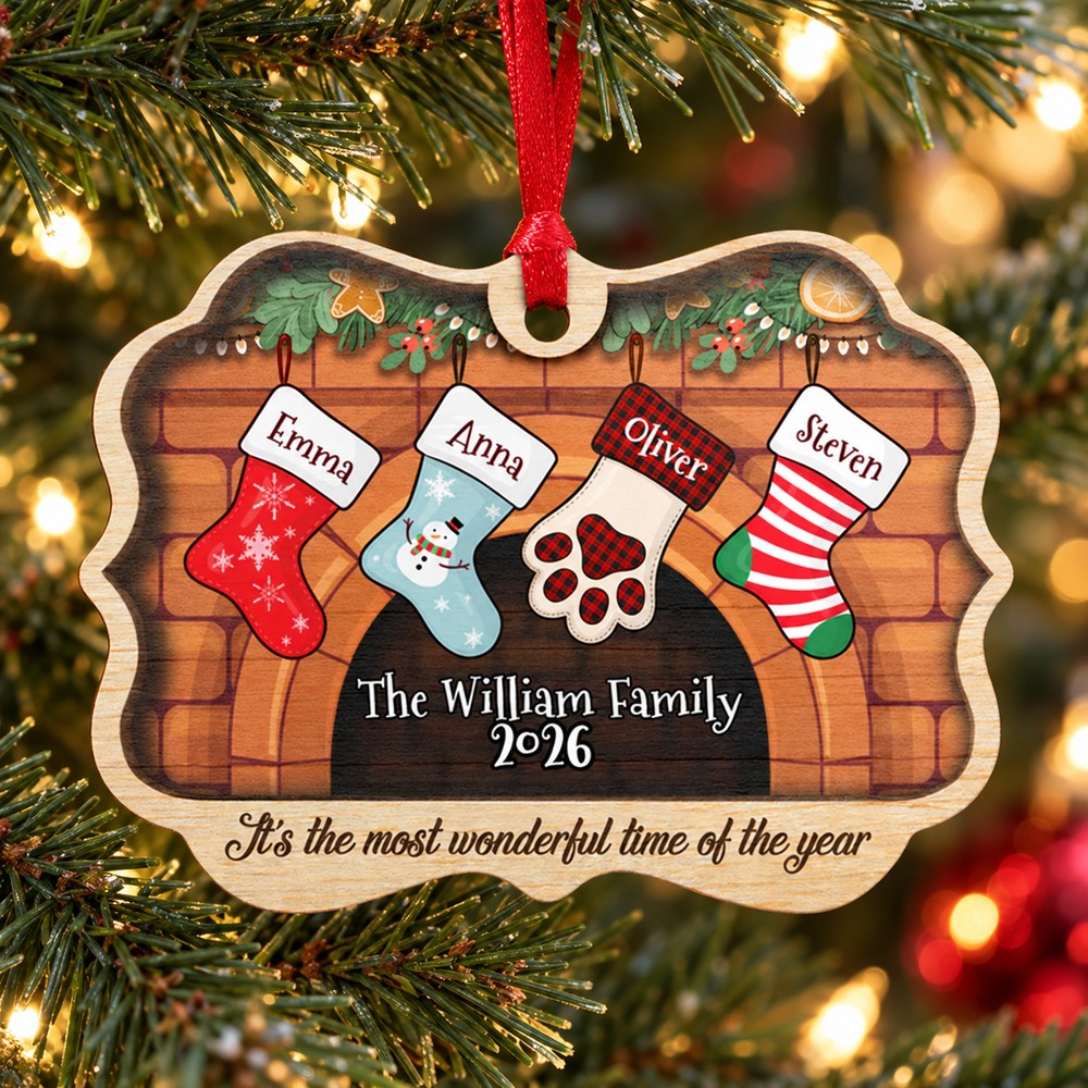 Personalized family stockings medallion ornament hanging on a Christmas tree branch