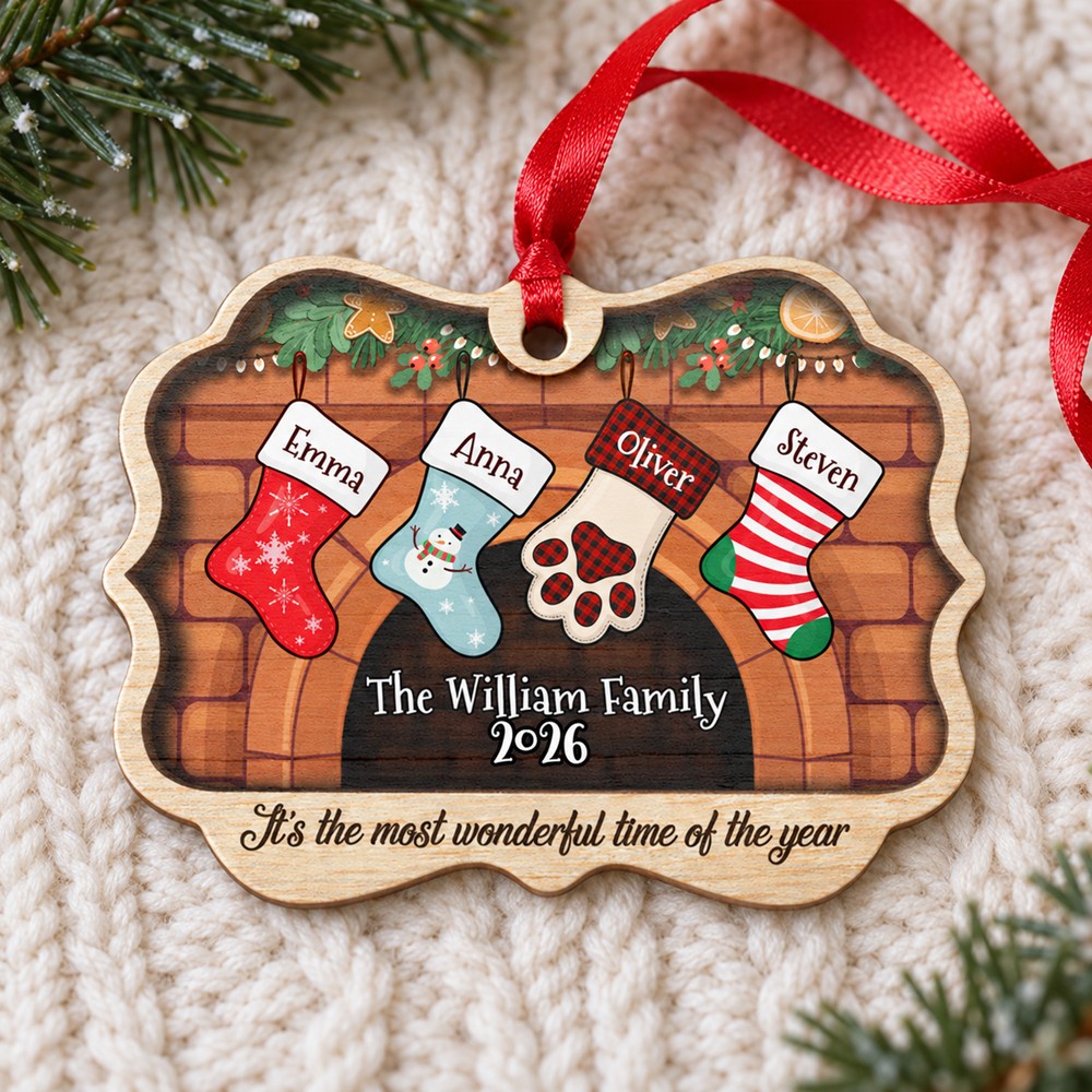 Christmas stockings personalized family ornament resting on cozy cream knit fabric