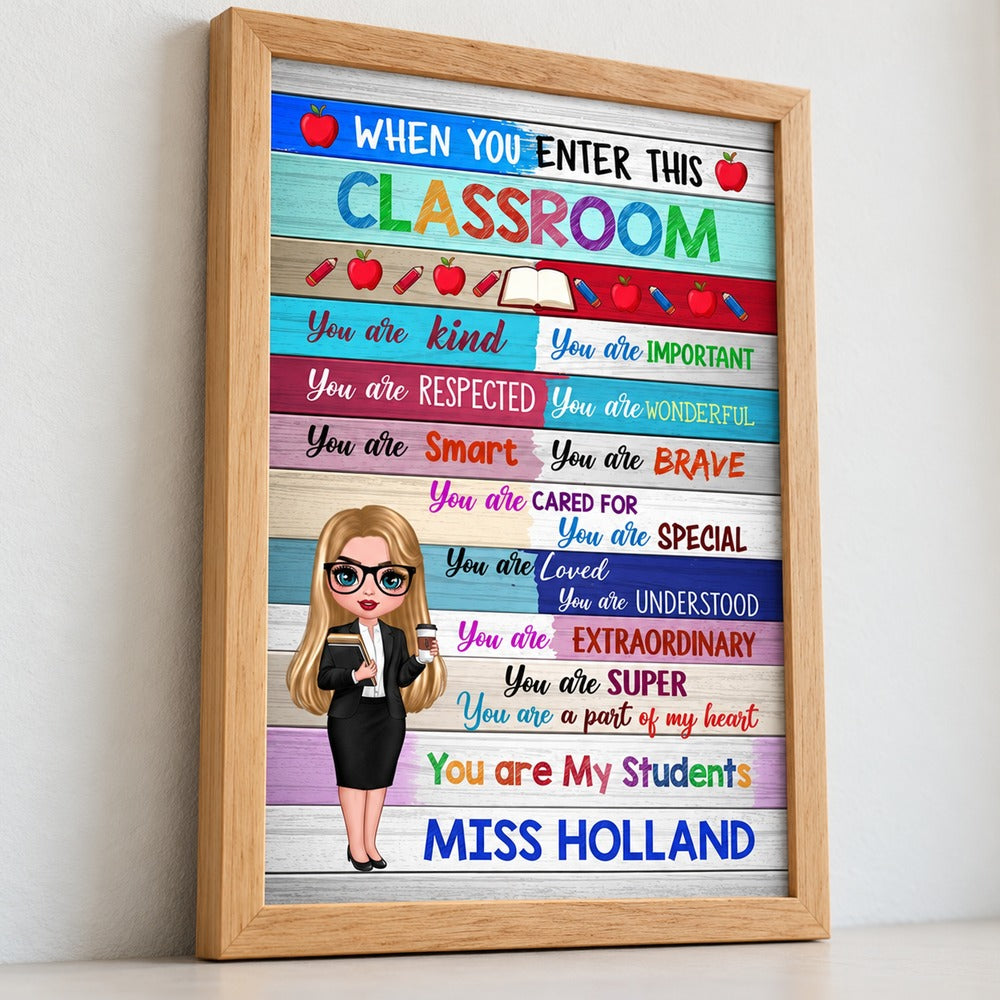 Close-up detail of the custom doll teacher illustration and wood frame on the classroom poster