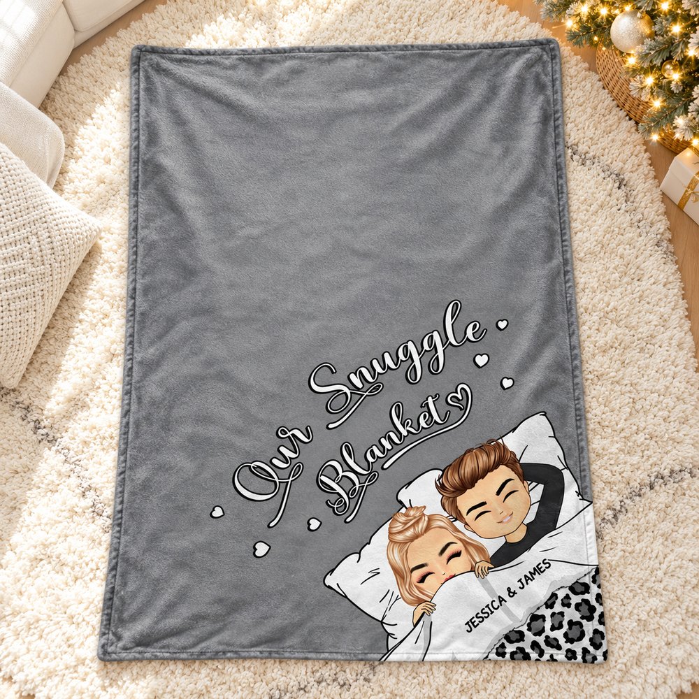 Custom Our Snuggle Blanket for couples laid flat on a cozy living room rug