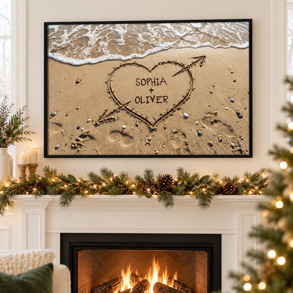 Couple Names Heart in Sand personalized framed poster hanging above holiday mantel