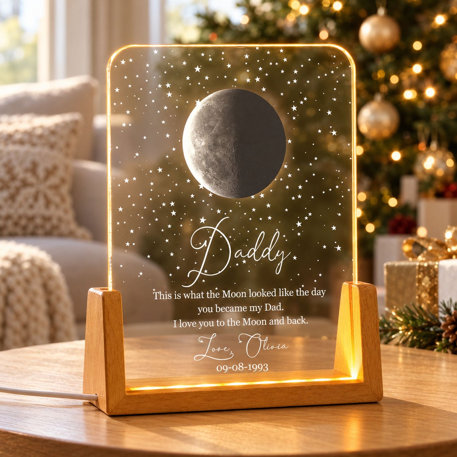 Custom Moon Phase Dad LED Night Light on side table with holiday tree in background