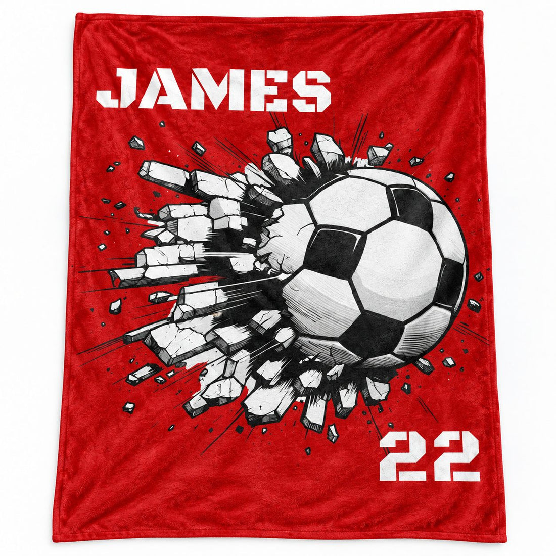 Close-up detail of the plush fleece texture and crisp soccer ball print on the custom blanket