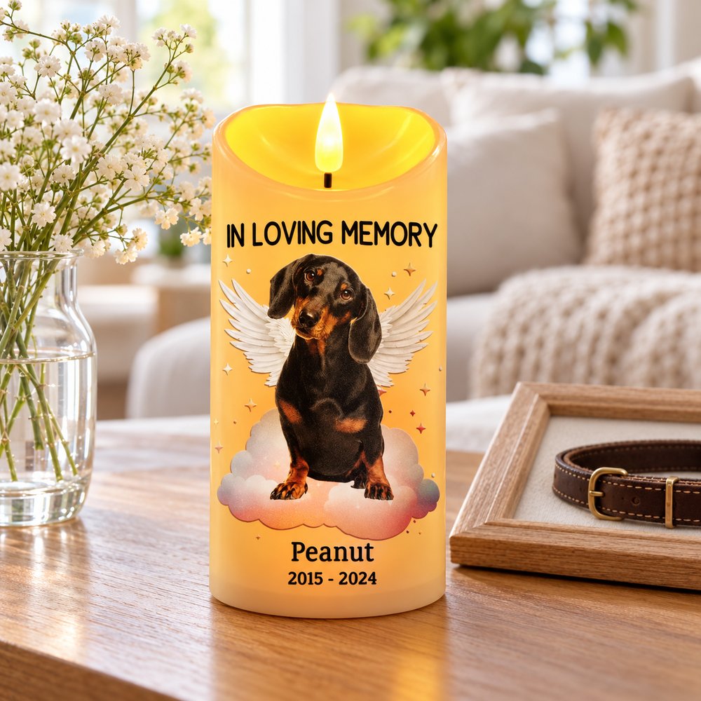 Custom photo dog cat memorial LED candle glowing on a home side table with white flowers