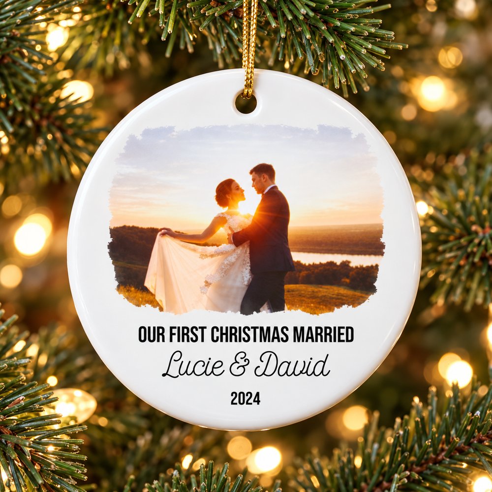 Custom photo first Christmas married circle ceramic ornament hanging on a Christmas tree branch