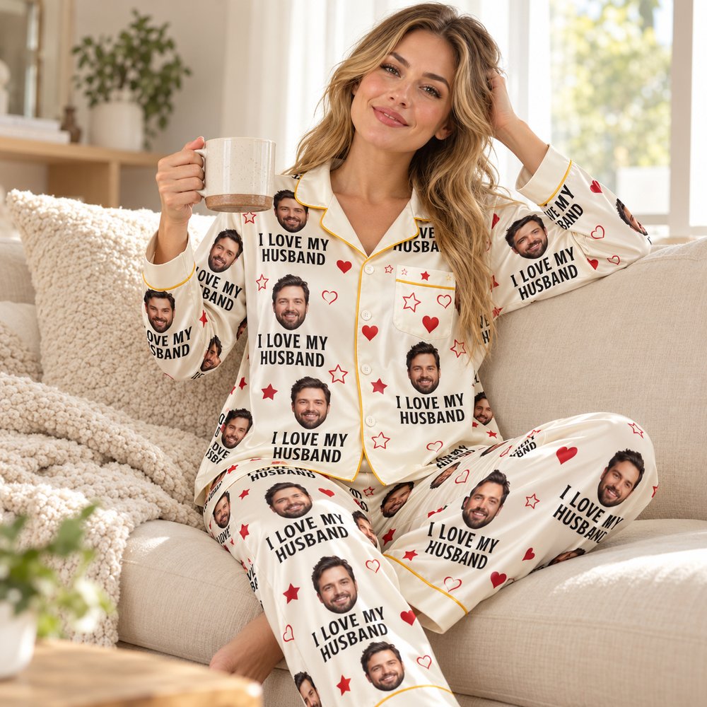 Woman wearing custom face I Love My Husband satin pajama set on a cozy sofa