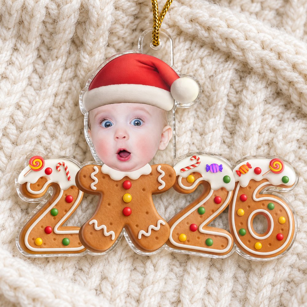 Macro closeup of custom shaped gingerbread baby photo acrylic ornament showing glossy edges and print detail