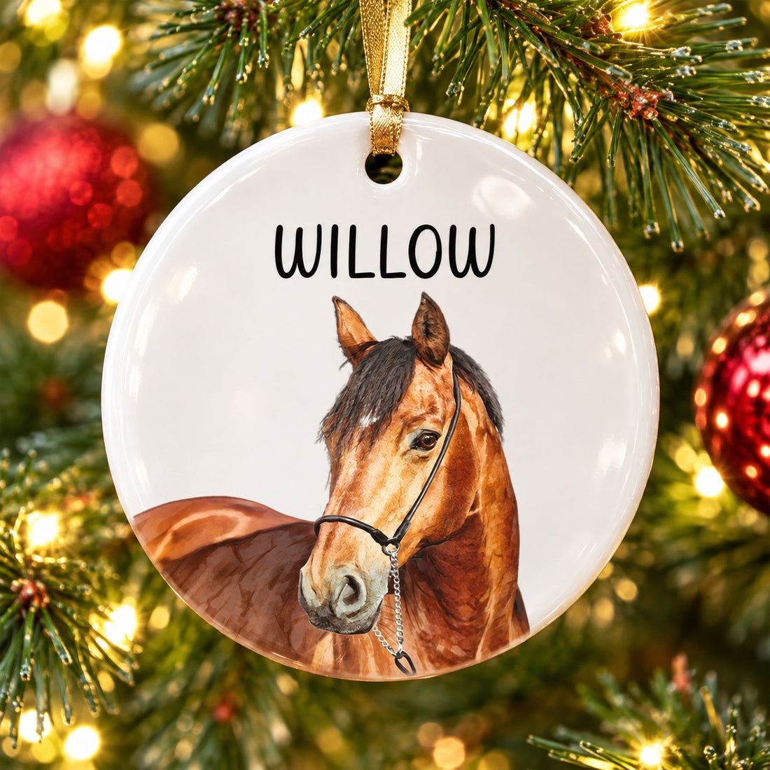 Custom photo horse ceramic ornament hanging on a Christmas tree branch with warm lights