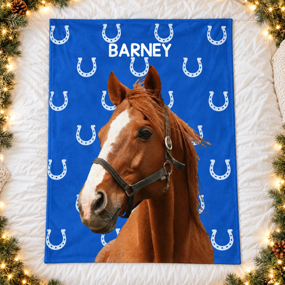 Custom photo horseshoe print blue BARNEY horse blanket spread flat on a holiday bed