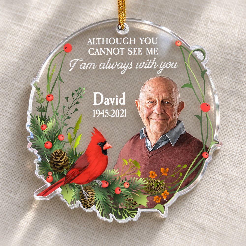 Close-up detail of custom-shaped acrylic ornament edges and vivid cardinal print