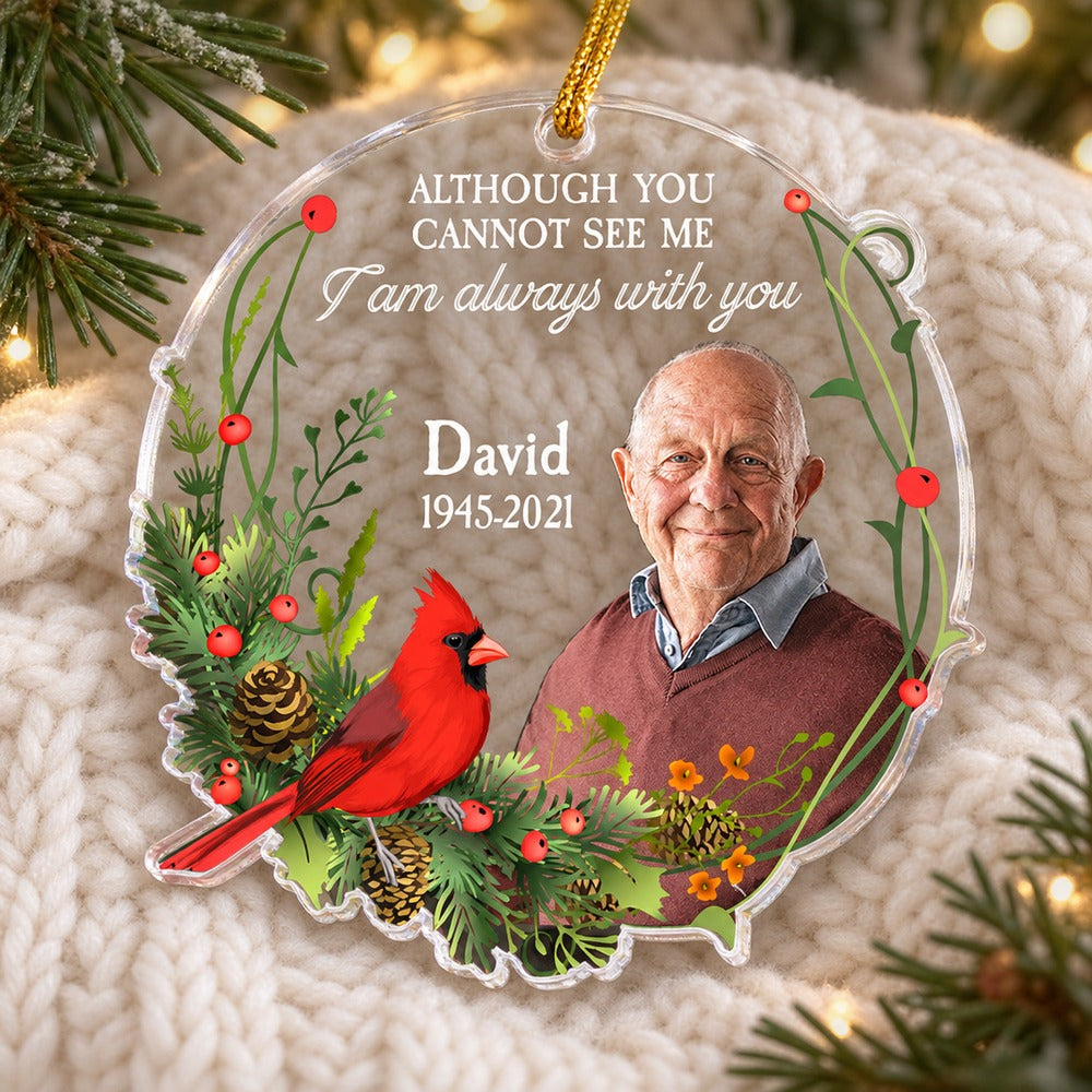 Custom photo memorial acrylic ornament I Am Always With You lying flat on a cozy knit blanket near pine greenery