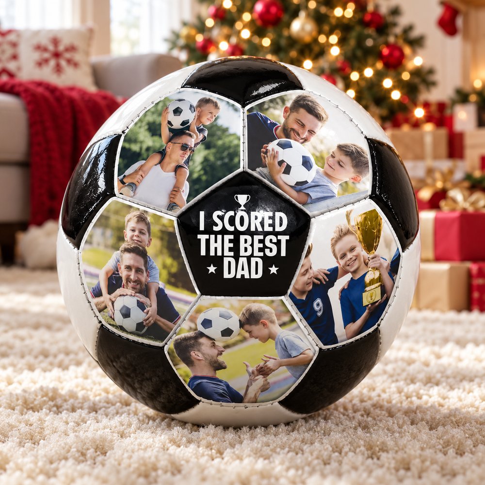 Personalized photo soccer ball for dad resting on a rug near a Christmas tree