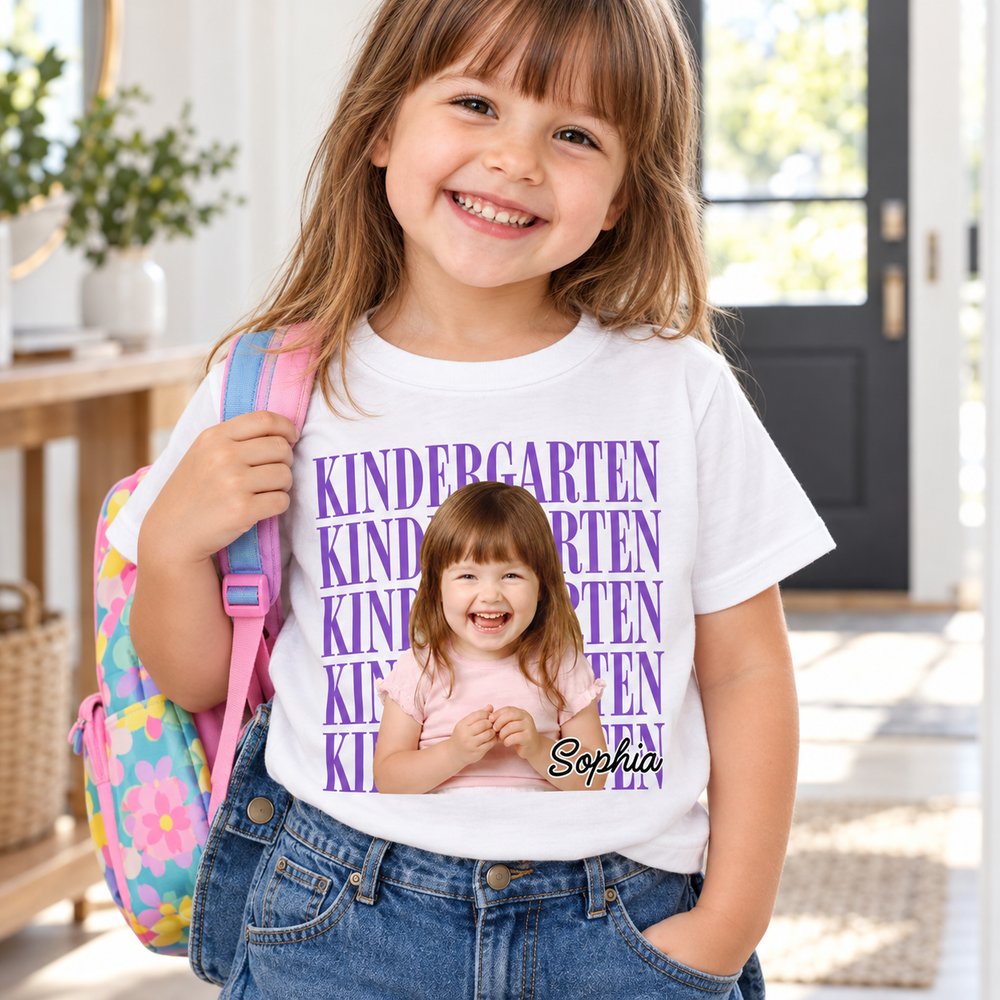 Young girl wearing custom photo kindergarten t-shirt with backpack in bright entryway