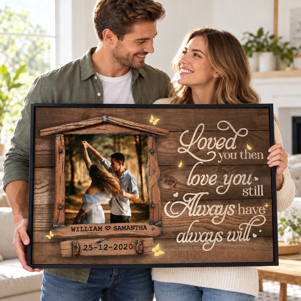Husband and wife holding their personalized Love You Still couple canvas print