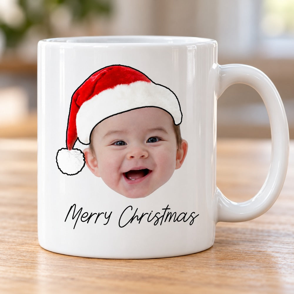 Close-up detail of custom baby photo and Merry Christmas print on glossy white ceramic mug