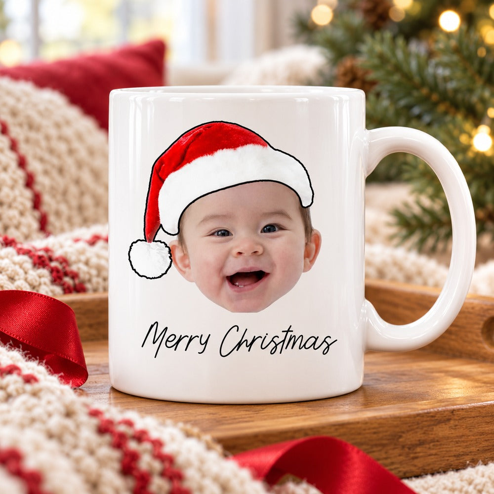 Custom photo Merry Christmas baby mug on a wooden tray with cozy holiday blanket decor