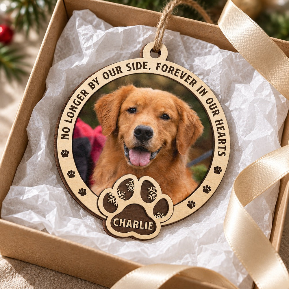 Personalized dog memorial wood ornament for Charlie nestled in a holiday gift box