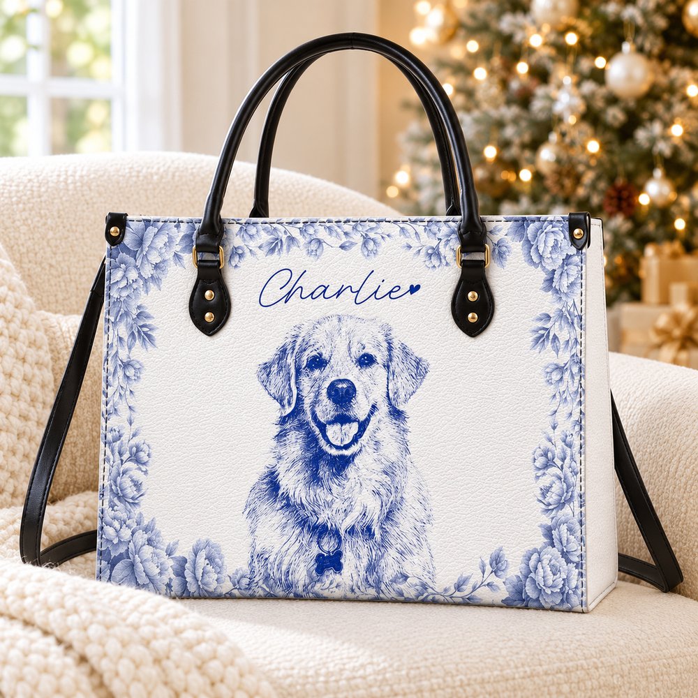 Personalized dog portrait leather handbag on an armchair by a Christmas tree
