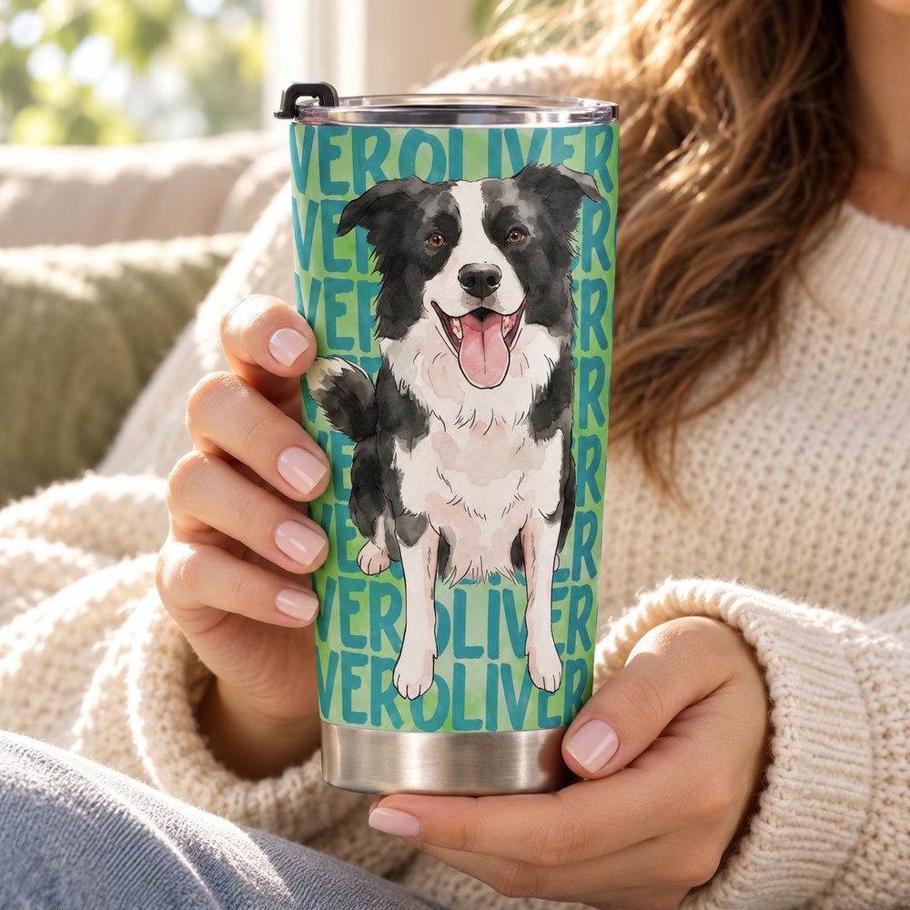 Pet lover holding personalized watercolor dog portrait 20oz tumbler in a cozy living room