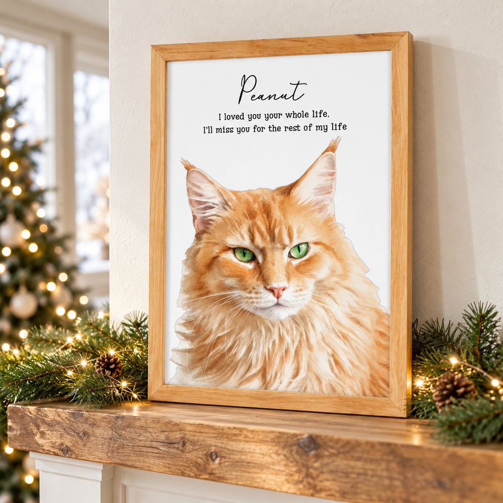 Custom watercolor cat memorial framed print displayed on a holiday mantel with pine garland