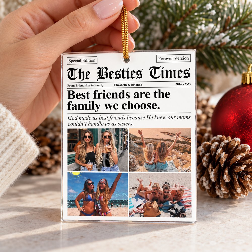 Hand holding 3.5 inch Besties Times acrylic ornament next to Christmas decor for scale