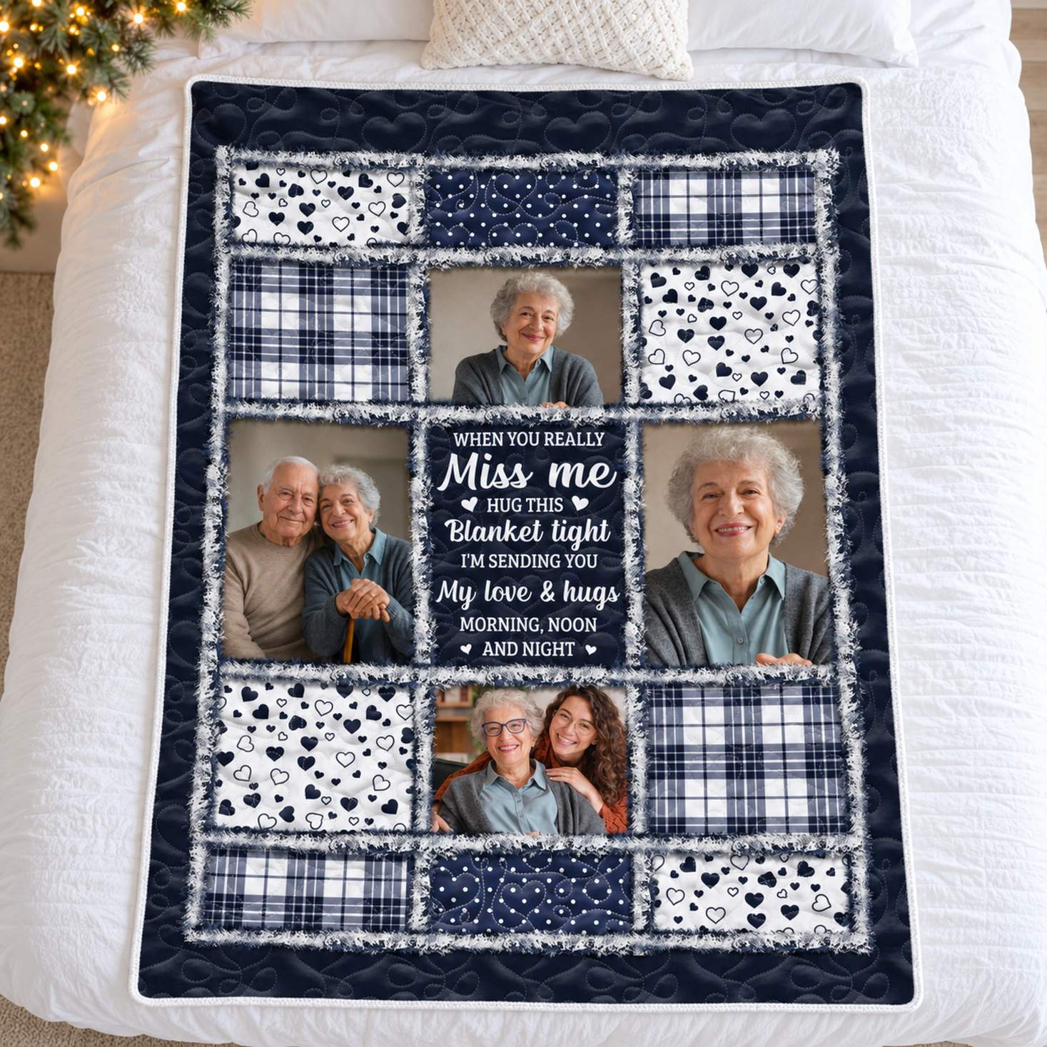 Custom photo memorial blanket spread flat on a bed with soft Christmas greenery in the corner