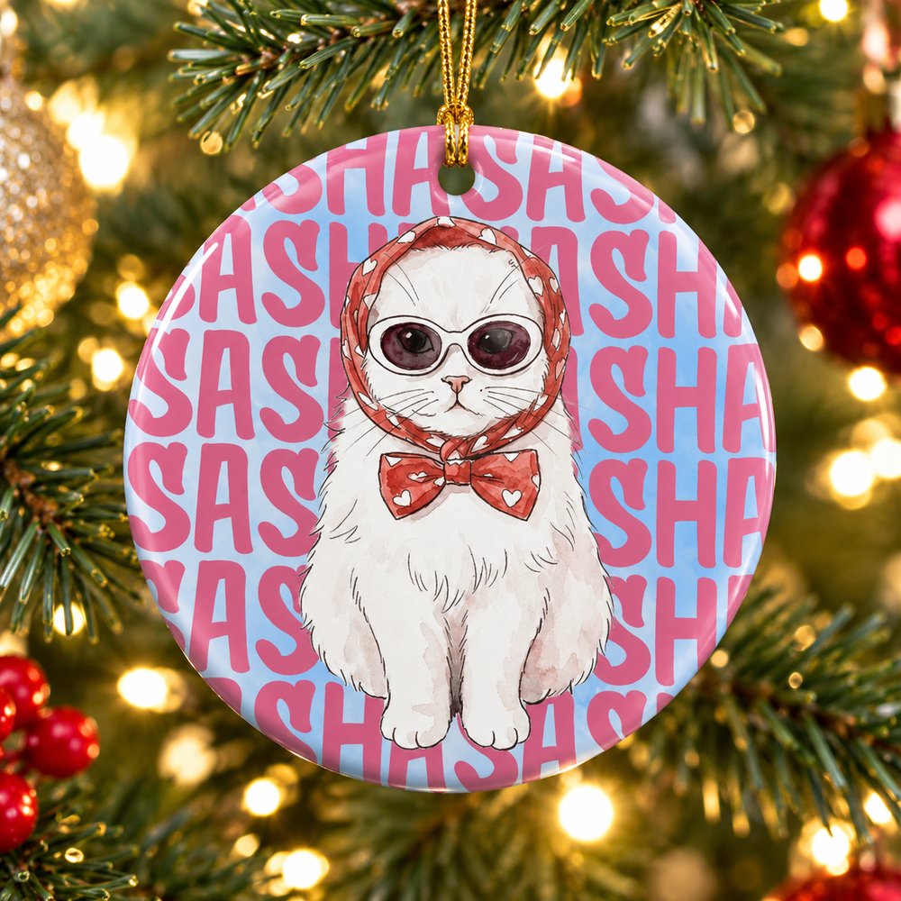 Close-up detail of glossy ceramic pet ornament print quality and gold cord