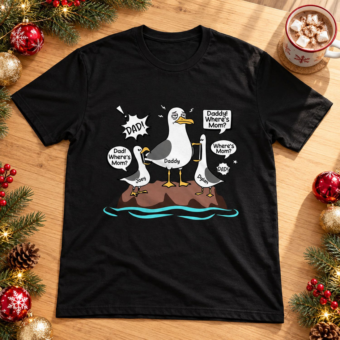 Personalized Dad Where's Mom seagull t-shirt laid flat with holiday pine garland and ornaments