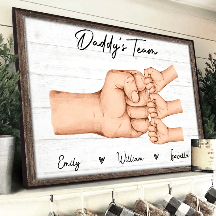 Personalized Daddy & Kids Fist Bump canvas print, framed in a bright living room