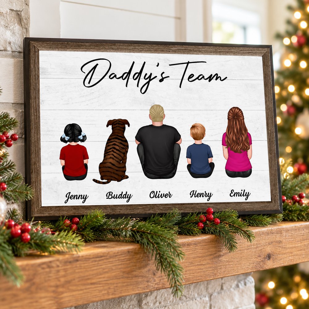 Daddy's Team personalized family framed canvas print on a holiday mantel with pine garland