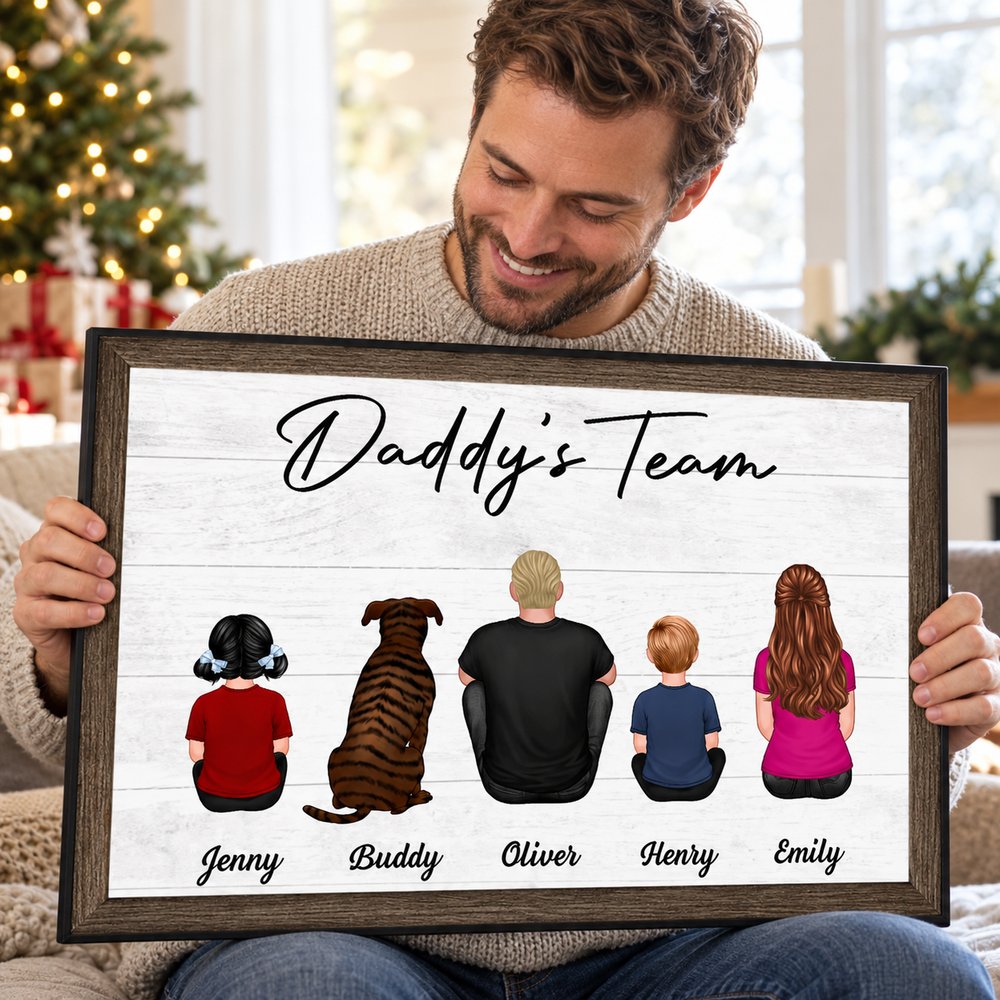 Happy dad holding his personalized Daddy's Team family sitting framed wall art gift