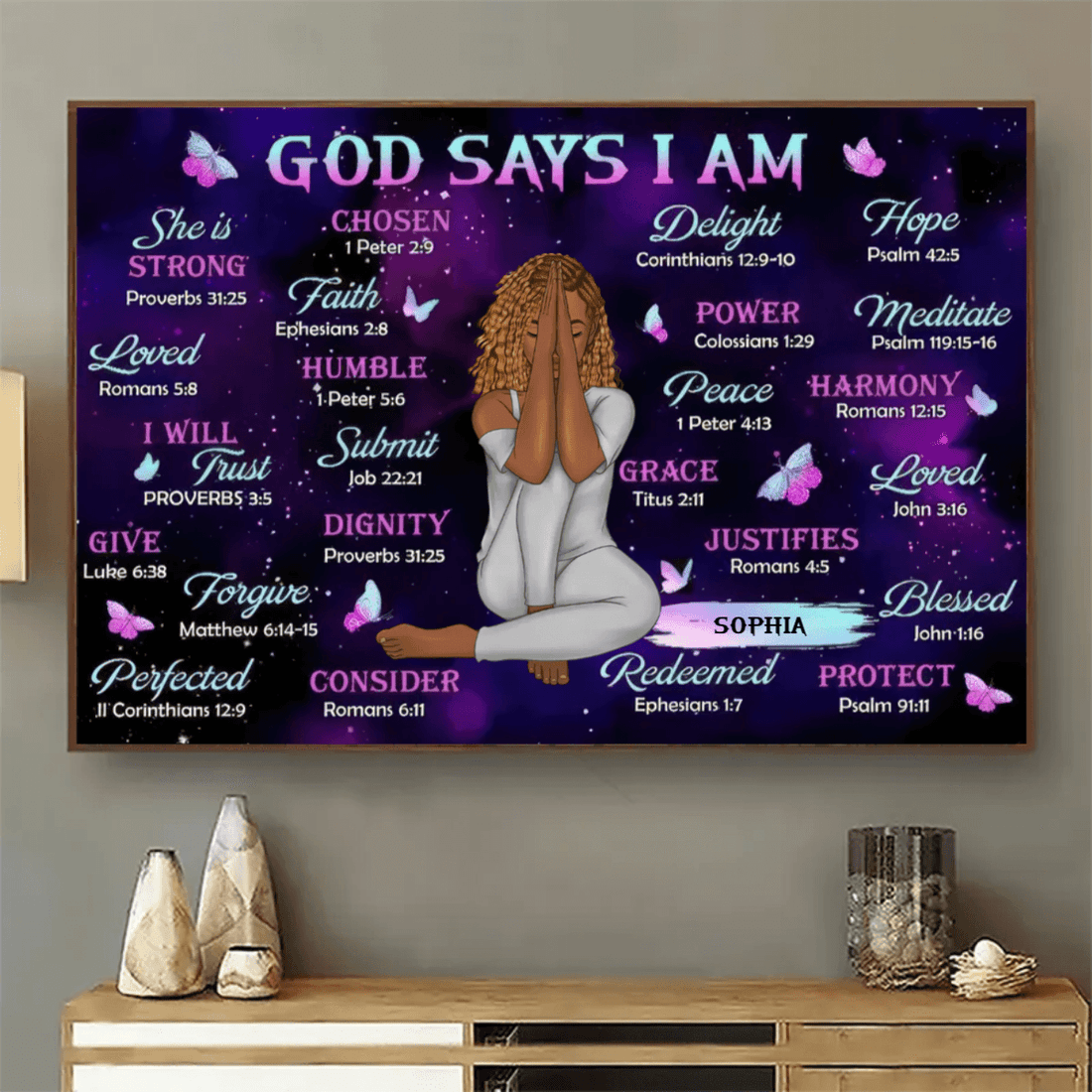 Personalized God Says I Am poster, a woman hanging the framed print on a wall