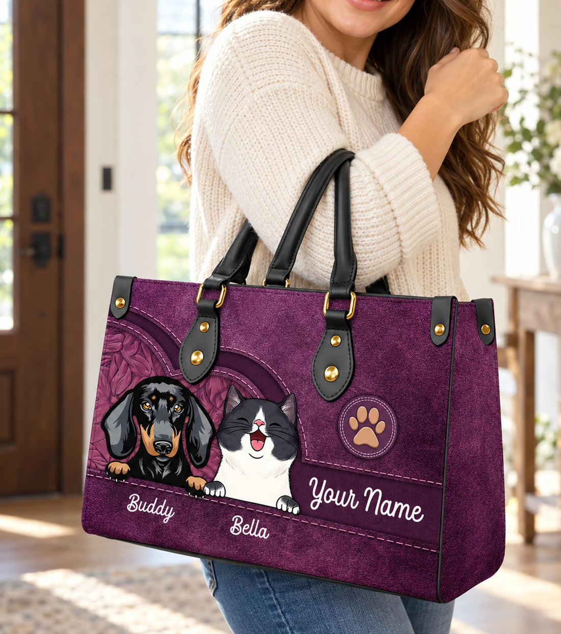 Woman carrying purple personalized dog and cat PU leather handbag by top handles in bright entryway