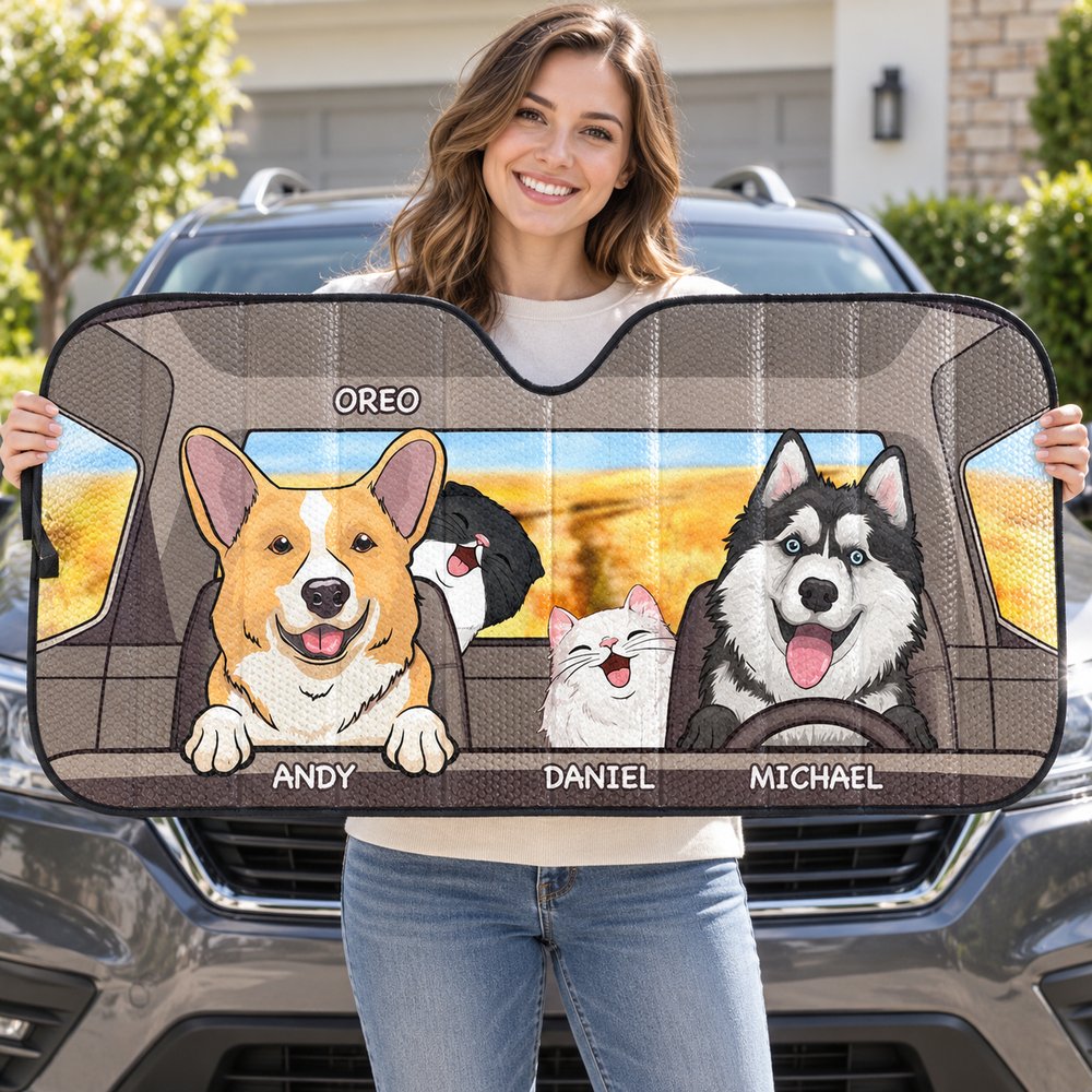 Happy pet owner holding a custom dogs and cats windshield sunshade beside their car